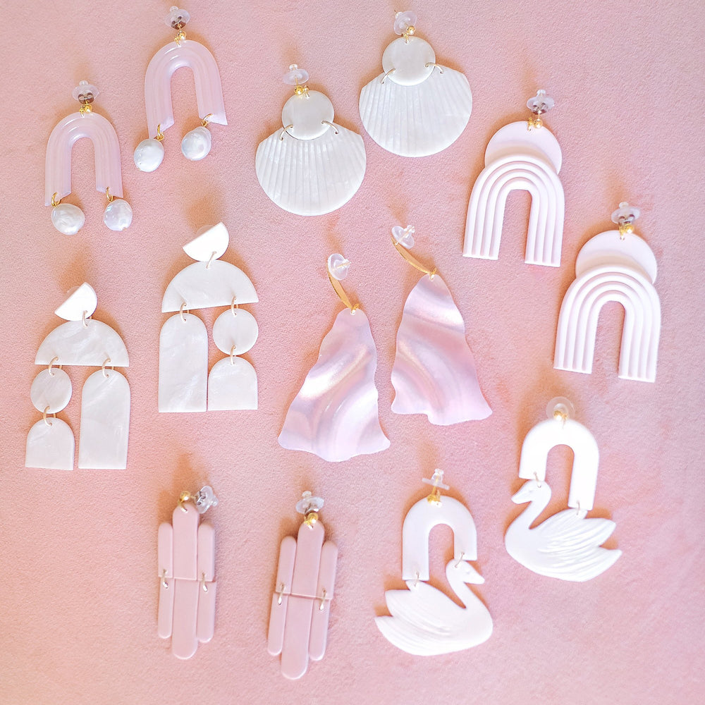 
                      
                        Earthrise Earrings in Shell Pink
                      
                    